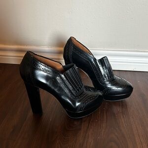 Givenchy black leather brogue loafers with high heels